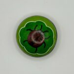 Ronde speksteen met lieveheersbeestje