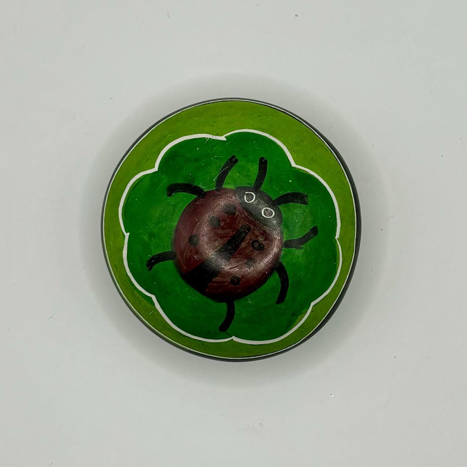 Ronde speksteen met lieveheersbeestje