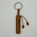 Sleutelhanger houten gebedsrolletje